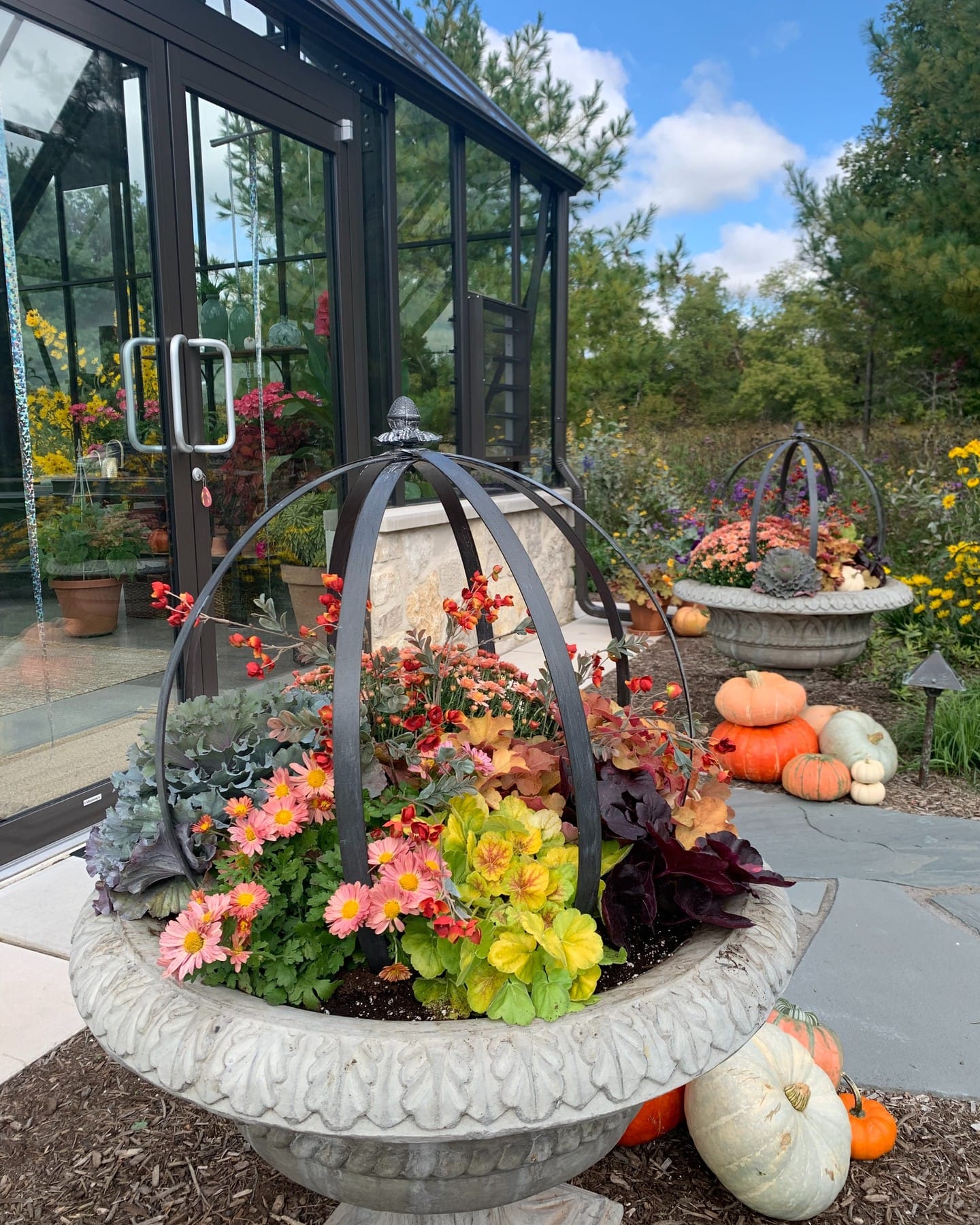 whimsical cast iron urn with unique shape