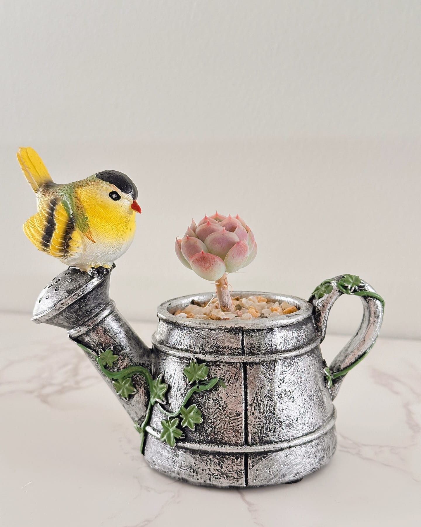 Birdseed planted in a vintage can